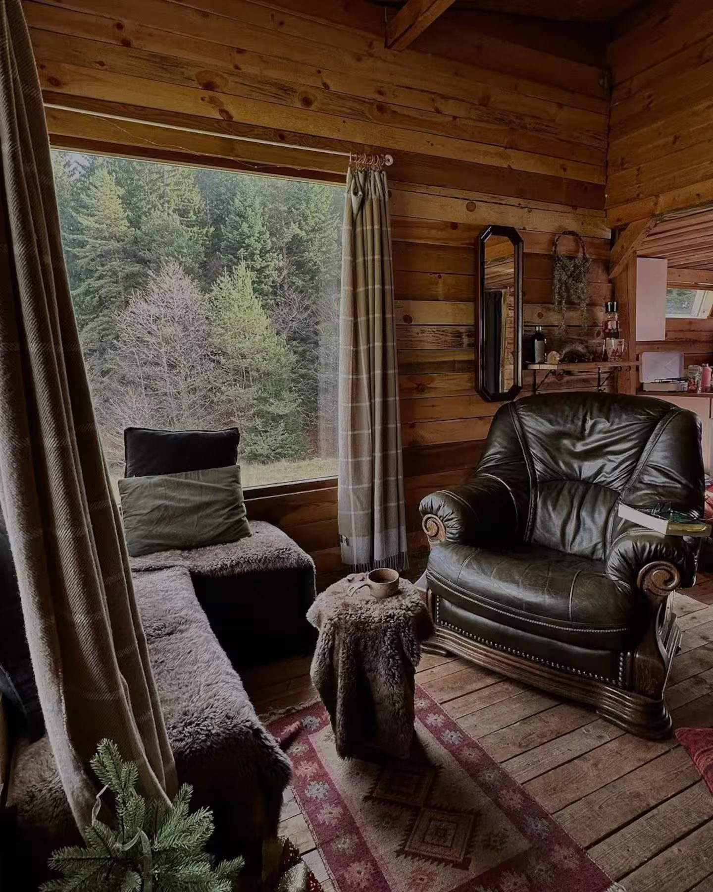 Family Christmas around the fire inside a Valley cabin